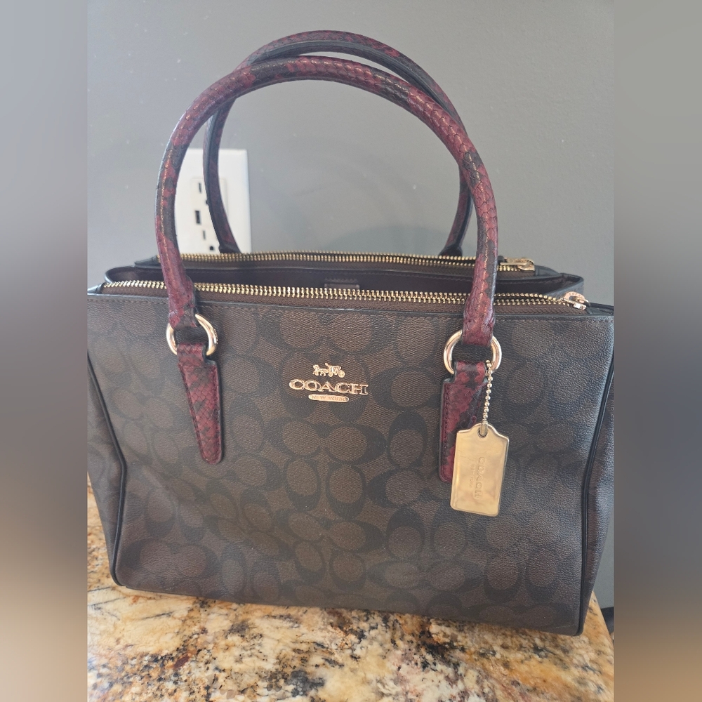 Coach Signature Canvas Satchel with Burgundy-Red Handles